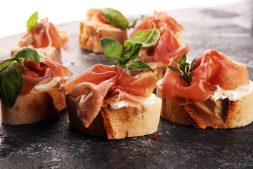 Iberico ham sandwich with homemade bread baked in wood oven or jamon sandwich with local herbs