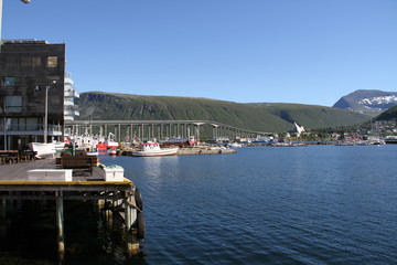 Fototapeta premium tromso tromsø water travel tourism sea coast nature port blue landscape sky harbor architecture europe boatship mountain summer bay view city beautifull 