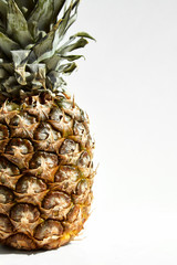 
Ripe pineapple fruit on a white background.Close-up.