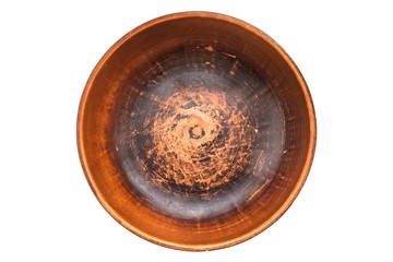 Clay bowl isolated on white. Closeup of a clay bowl, top view.