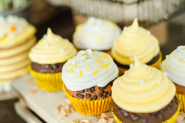 cake with hares and a white and yellow cake on the table