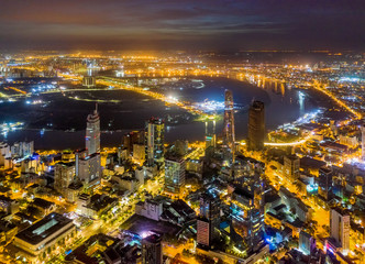 Top view aerial of Thu Thiem peninsula and center Ho Chi Minh City  with development buildings, transportation, energy power infrastructure. Financial and business centers in developed Vietnam
