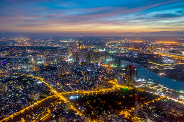 Top view aerial of Thu Thiem peninsula and center Ho Chi Minh City  with development buildings, transportation, energy power infrastructure. Financial and business centers in developed Vietnam