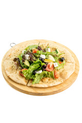 tortilla with fresh salad vegetables isolate on a white background