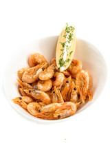 prawns with lemon on isolate white background
