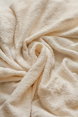 Fototapeta na wymiar Texture of a gentle towel top view