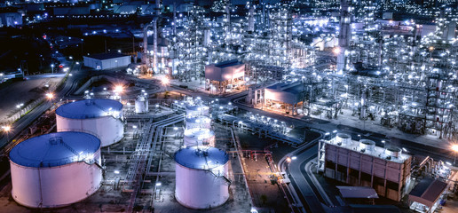 Large oil refinery industrial estates. Fuel refinery industry at night