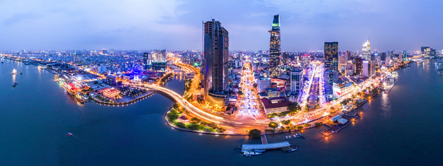 Top view aerial photo from flying drone of a Ho Chi Minh City with development buildings,...