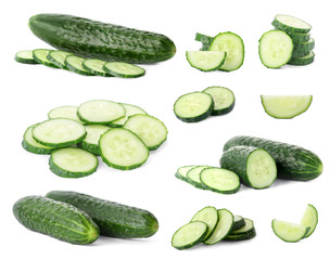 Set with sliced cucumbers on white background