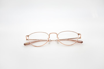 Pink eyeglasses with white background