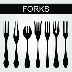 Fork in black and white. Silhouette of forks on a white background.