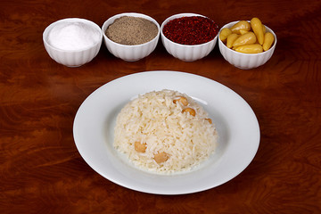 excellent turkish food chickpea rice spicy on white plate