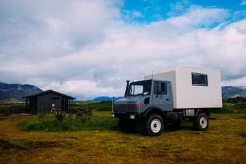 large all-terrain camper off-road vehicle in a camping national park iceland in summer
