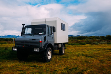 large all-terrain camper off-road vehicle in a camping national park iceland in summer