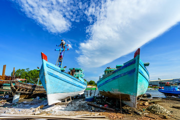 Worker in Shipyard. Shipyard industry ,( ship building) Big ship on floating dry dock in shipyard, Phu Quoc island, Kien Giang, Vietnam