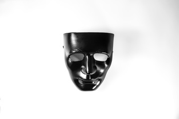 Simple full face black mask in a white background