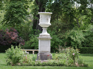 Antique style marble vase in Versailles palace gardens near Paris, France