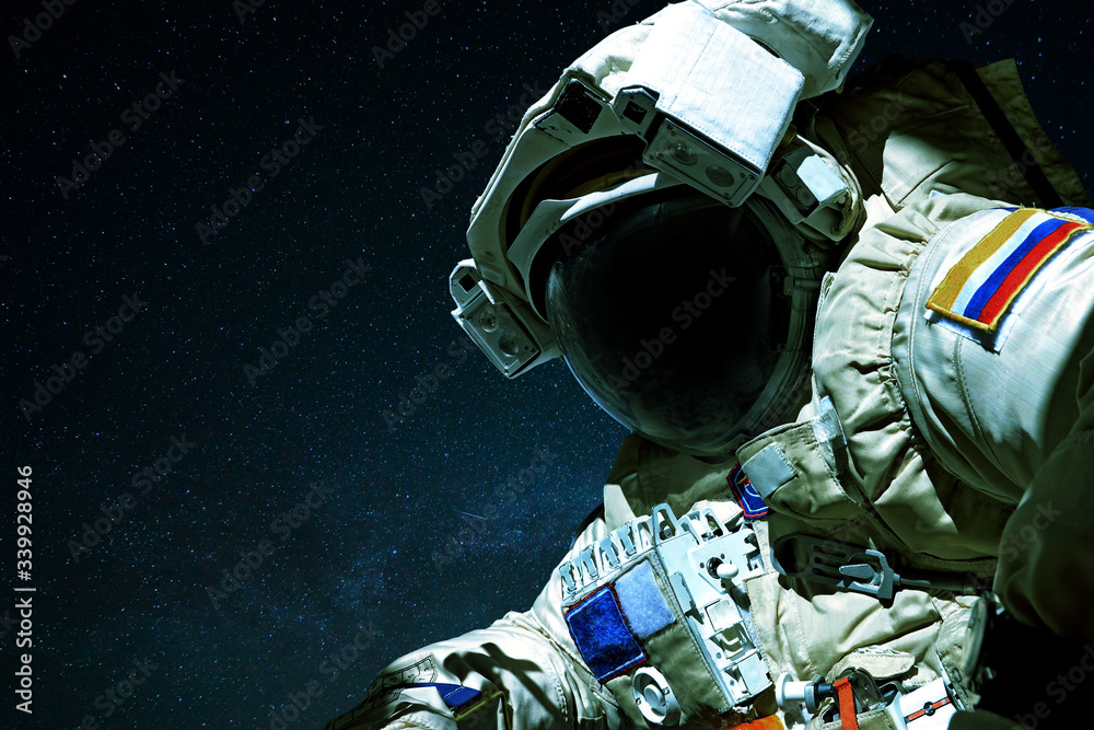 Poster space man in open space against the background of stars. astronaut travels in space