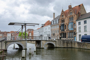 Drawbridge in Bruges, Belgium. Traditional bride over canal in Brugge.