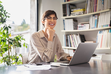 Young businesswoman in office