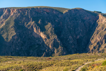 Naklejka premium Steep mountains in the Cejor near the Beninar reservoir