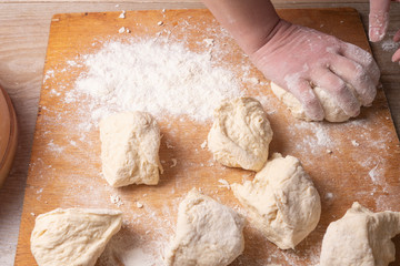 dumplings, ravioli, rolling pin, dough, board, hand, indoors, woman, female, motion, healthy, table, ingredient, organic, delicious, bowl, meal, cooking, culinary, bread, kitchen, lifestyles, slice, k