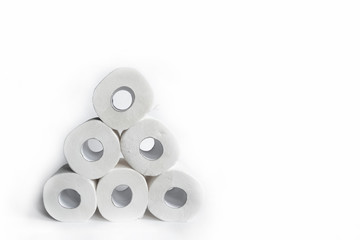Fototapeta premium Toilet paper rolls on white backgorund. Hygiene concept. White paper texture. Household concept.