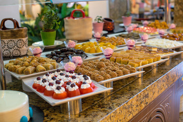 Traditional Turkish sweets at the open buffet in a hotel in Turkey