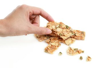 Cracker with almond and nut on white background, traditional Malaysian sweet snack.