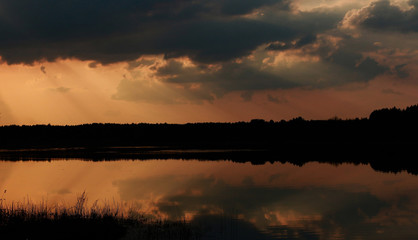 Mirror image of the setting sun