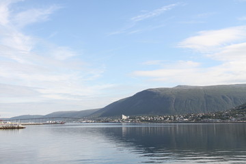 tromso tromsø  water travel tourism sea coast nature port blue landscape sky harbor architecture europe boatship mountain summer bay view city beautifull and mark mediterranean vacation town