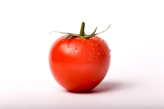 Fresh tomato isolated on white, copy space