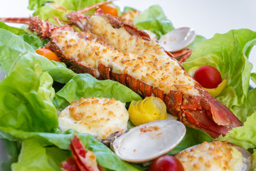 An assortment of baked seafood with cream and cheese