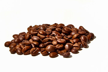 Arabica and Robusta coffee beans on a white background