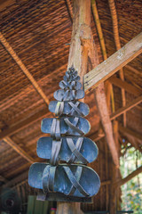 Showcase of smart sandals worn during Vietnam War in Cu Chi tunnels, Ho Chi Minh city, Vietnam