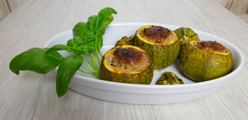 courgette stuffed with minced meat cherry tomatoes and cheese

