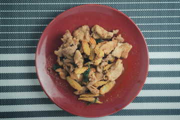 Stir-fried pork with roasted chili paste and yellow baby corn