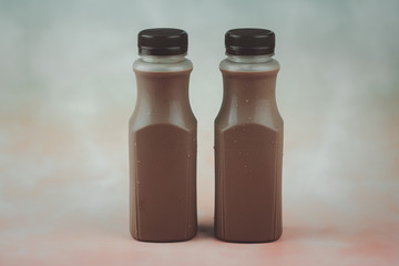 Tasty dark cocoa milk in plastic bottle