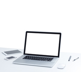 Laptop computer on desk with isolated screen for mockup. business and technology concept