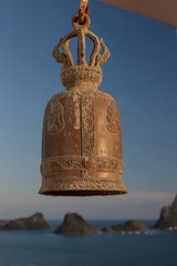 Fototapeta premium Bell with ocean view at Buddhist Temple Wat Khao Chong Kaeo. In Prachuap Khiri Khan, Thailand. 