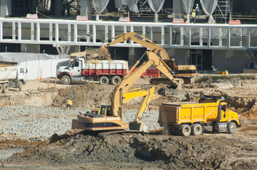 Excavation work with tippers and backhoe.