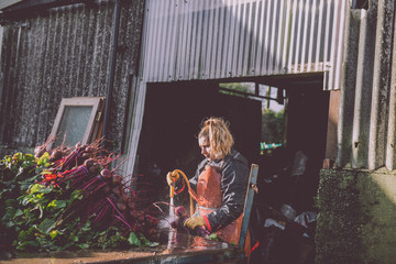 Female Farmer washing beetroot