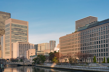 Fototapeta na wymiar OSAKA, JAPAN - January 14, 2020: Modern office building in Osaka, Japan