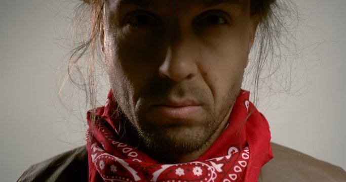 Portrait of a cowboy with a hat, lifting his head up, western gunslinger, 4k