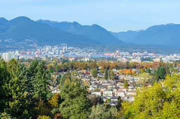 Fototapeta na wymiar View on Vancouver Downtown and Mountains with Fall Colours. British Columbia. Canada.
