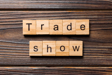 Trade Show word written on wood block. Trade Show text on wooden table for your desing, concept