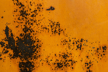 Old rusted metal fence. Orange texture. Copy space