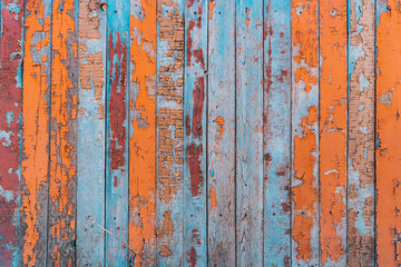 Wooden old fence. Textured colorful background. Copy space