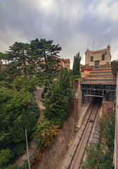Fototapeta na wymiar Small station of the Vallvidrera funicular railway with Barcelona at its feet