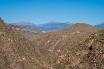 mountainous landscape near the Beninar reservoir (Spain)